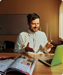 An instructor explaining at a screen